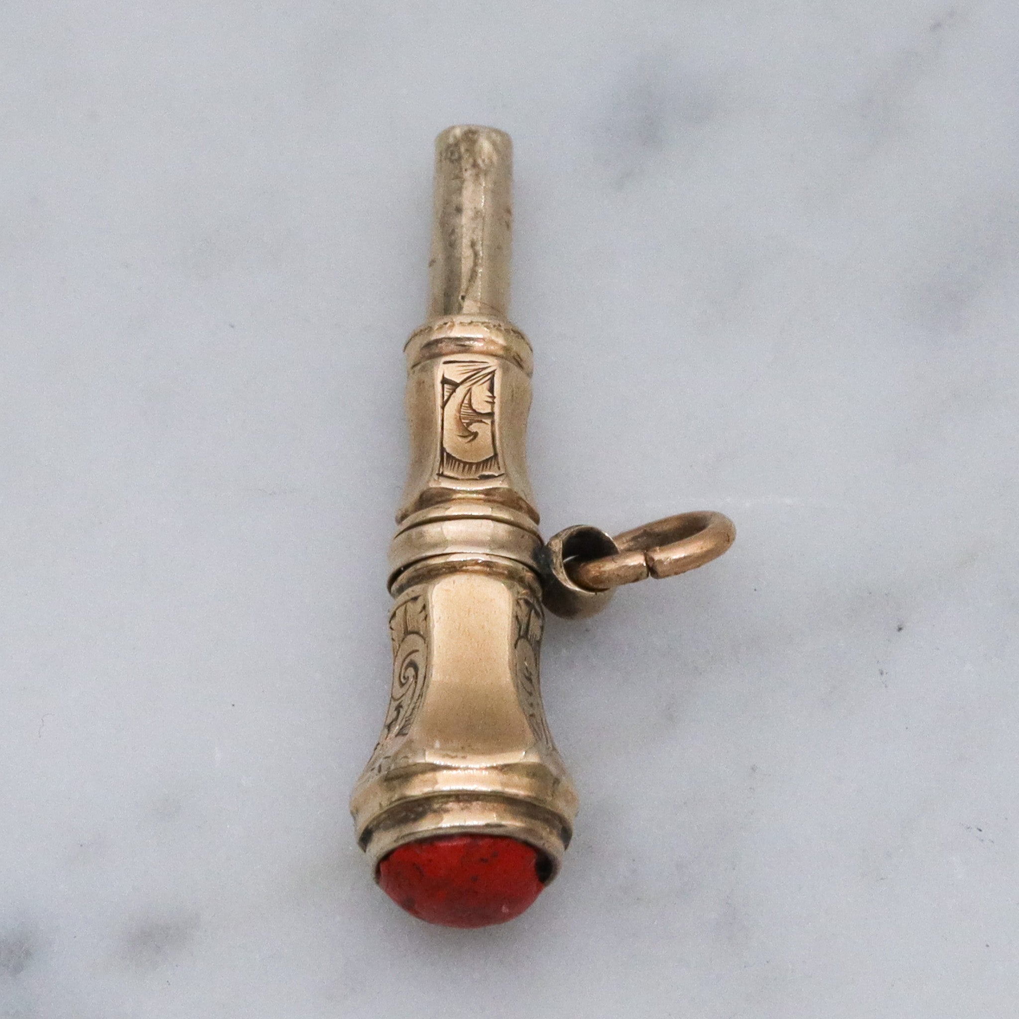 Antique Victorian 10k gold watch key fob with red stone end